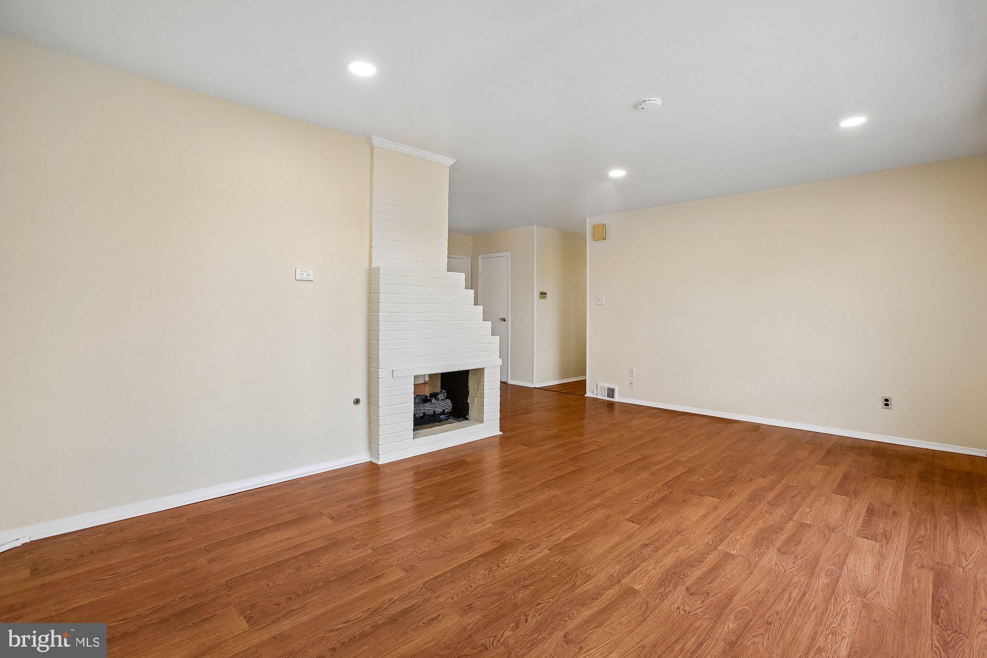 6621 Edsall Road Springfield, VA 22151 - Photo 4 of 42 a view of empty room with wooden floor