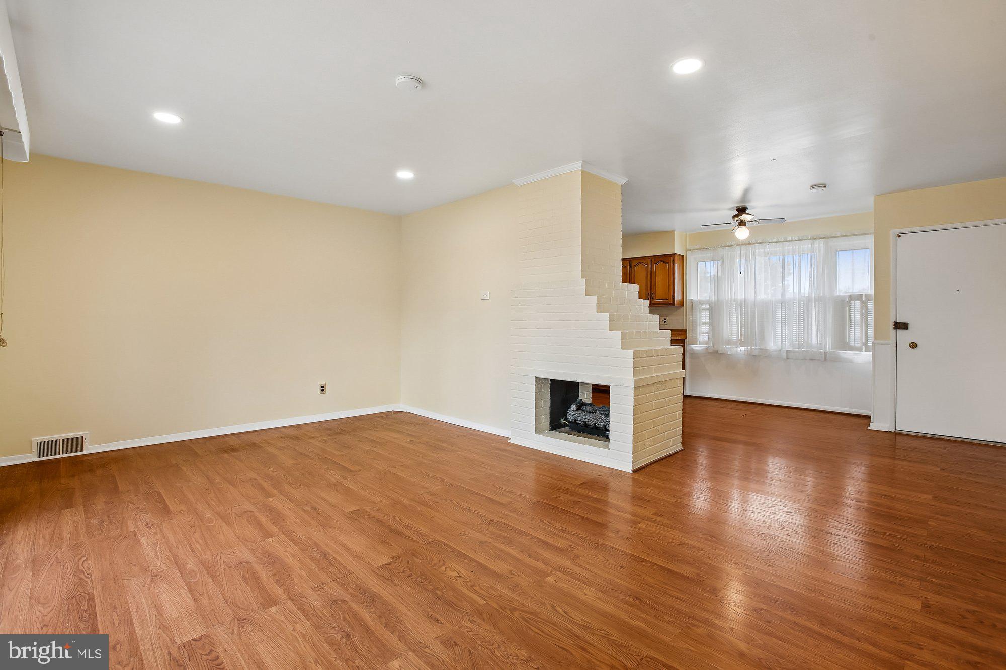 6621 Edsall Road Springfield, VA 22151 - Photo 5 of 42 a view of empty room with wooden floor