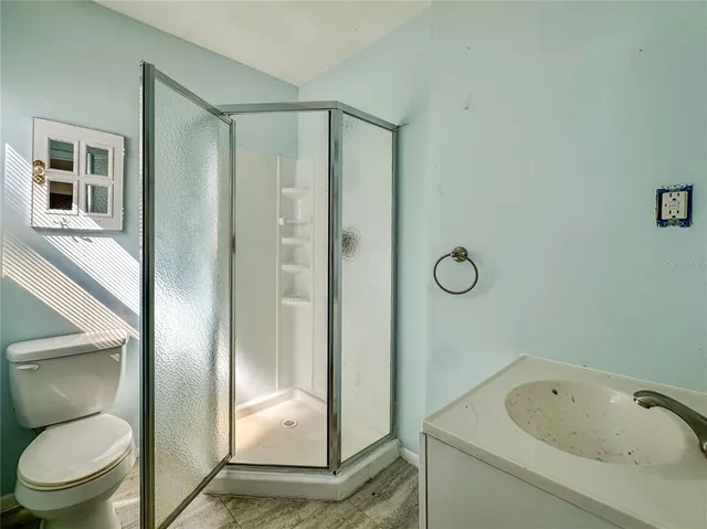 a utility room with a sink dryer and washer