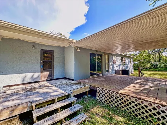 a front view of a building with swimming pool
