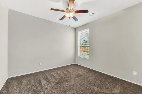an aerial view of house with a yard