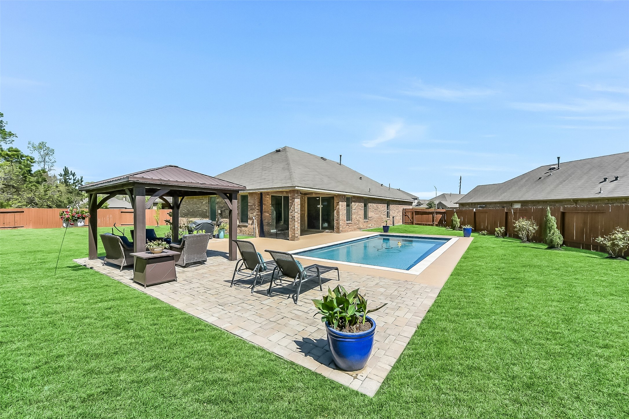 24407 Hollow Gate Meadow Court Spring, TX 77389 - Photo 26 of 39 a front view of a house with garden