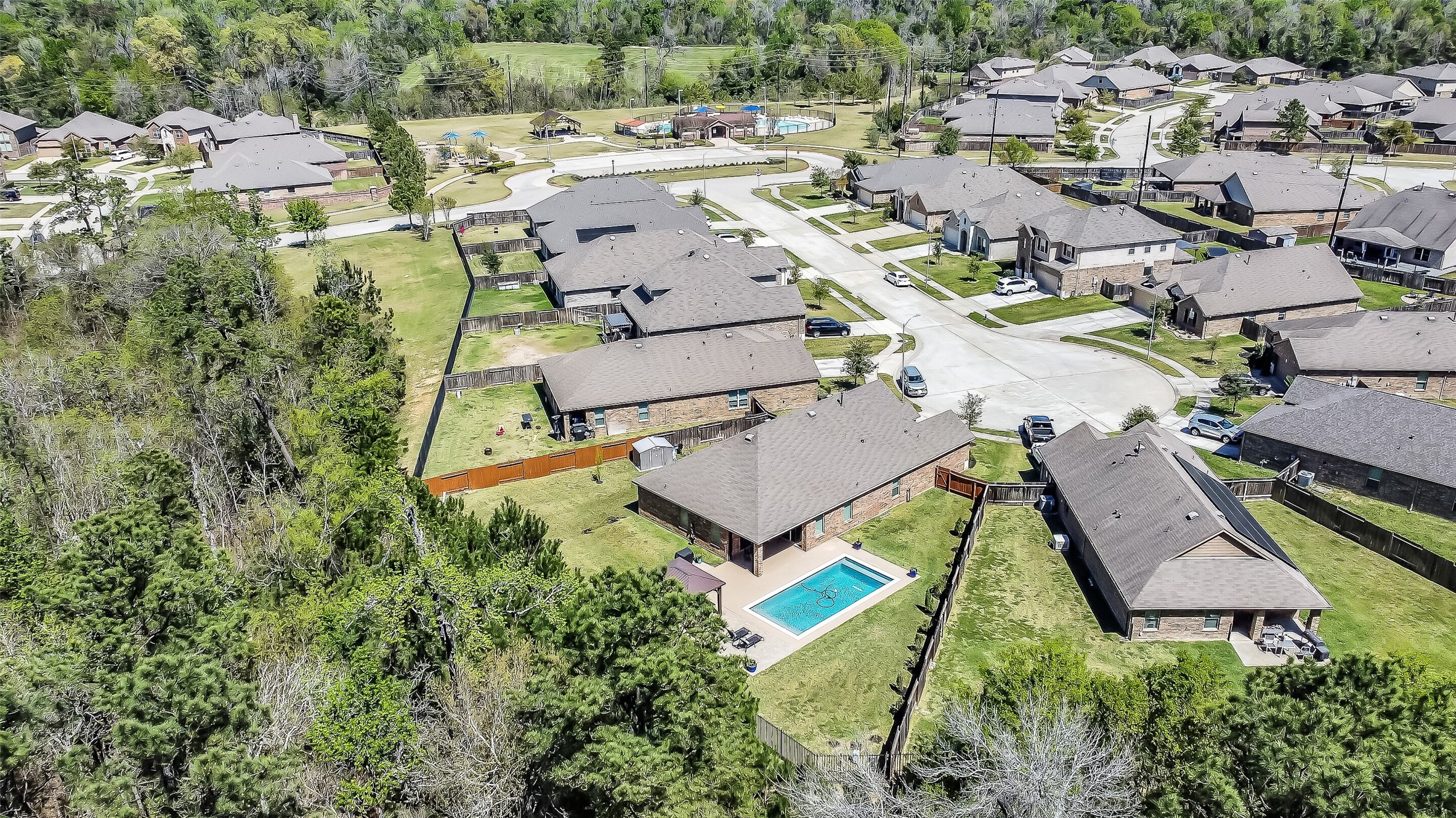 24407 Hollow Gate Meadow Court Spring, TX 77389 - Photo 38 of 39 an aerial view of a house with a garden