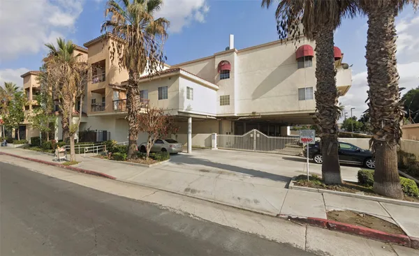 front view of a house with a street