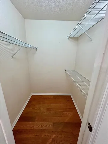 a view of a room with racks on the wall