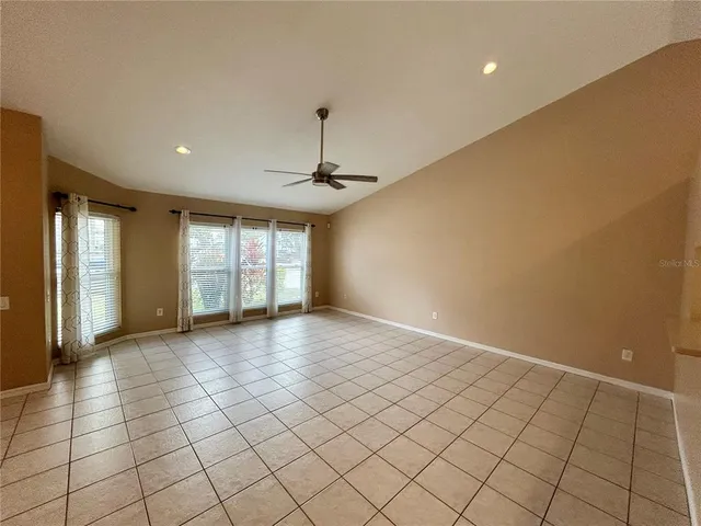 a view of an empty room and window