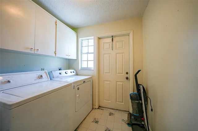 a bathroom with a toilet a sink and a mirror