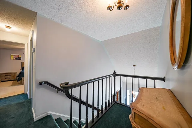 a view of a swimming pool with lounge chair