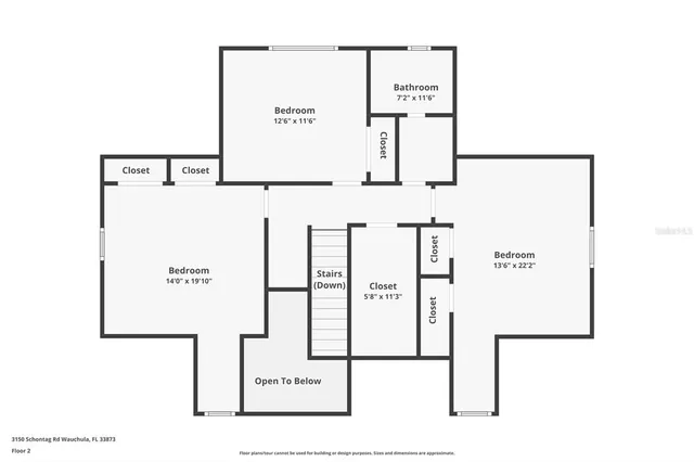 an aerial view of a house with a garden