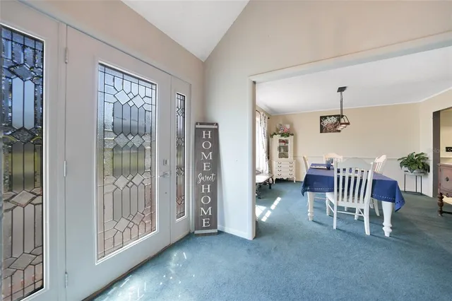 a view of entryway with livingroom