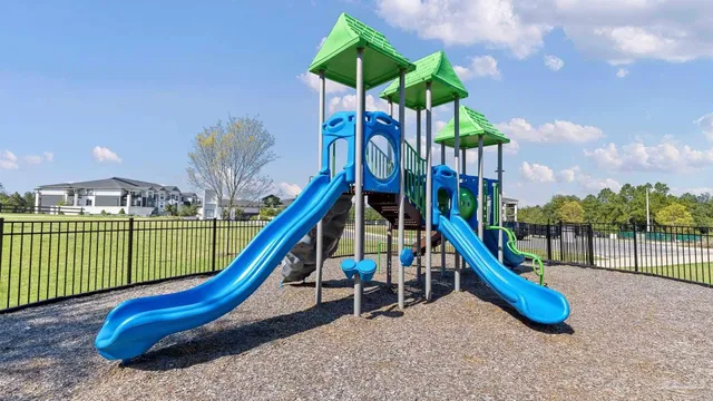 a view of a park with a slide