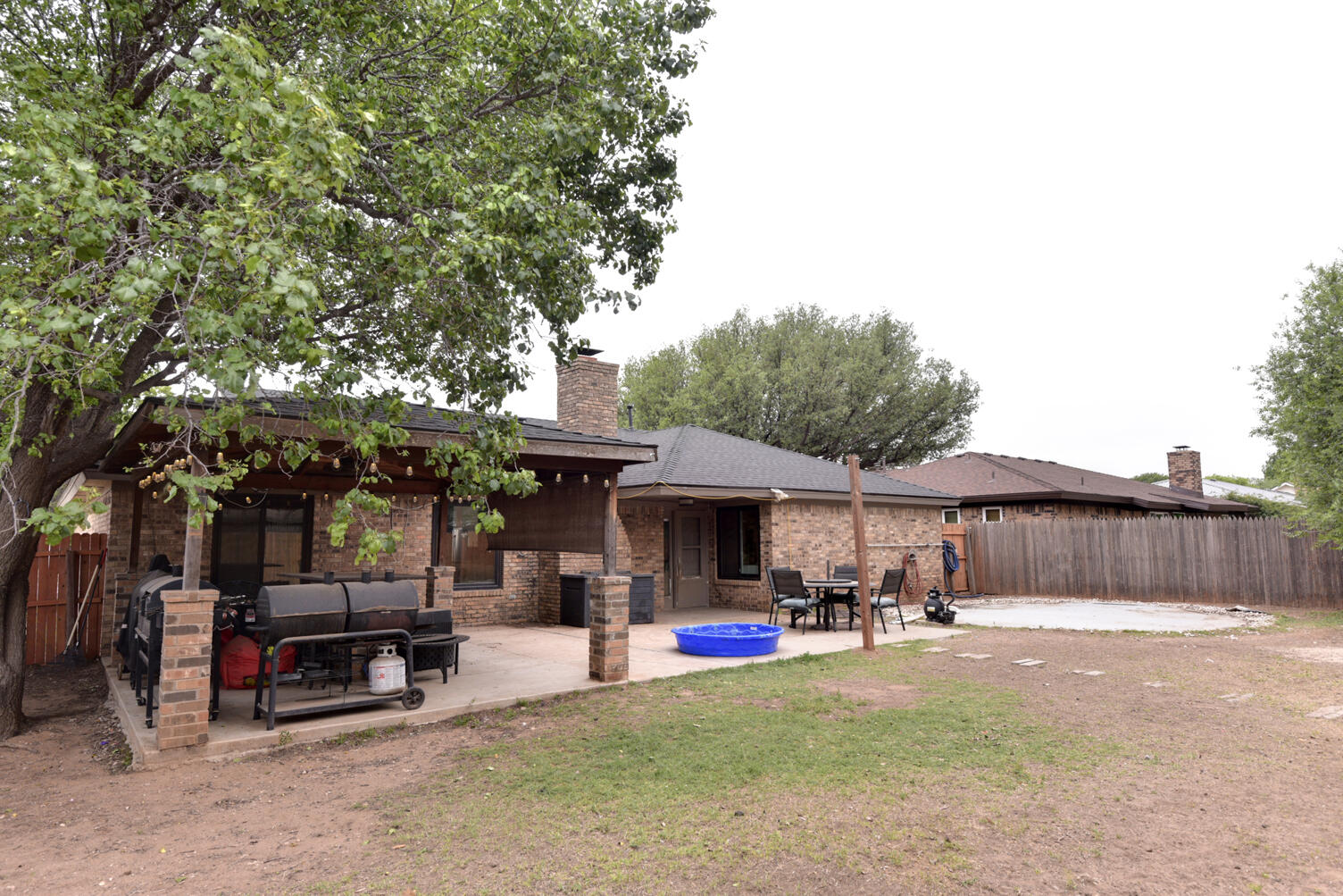 5202 93rd Street Lubbock, TX 79424 - Photo 28 of 28 a view of a white house in the background