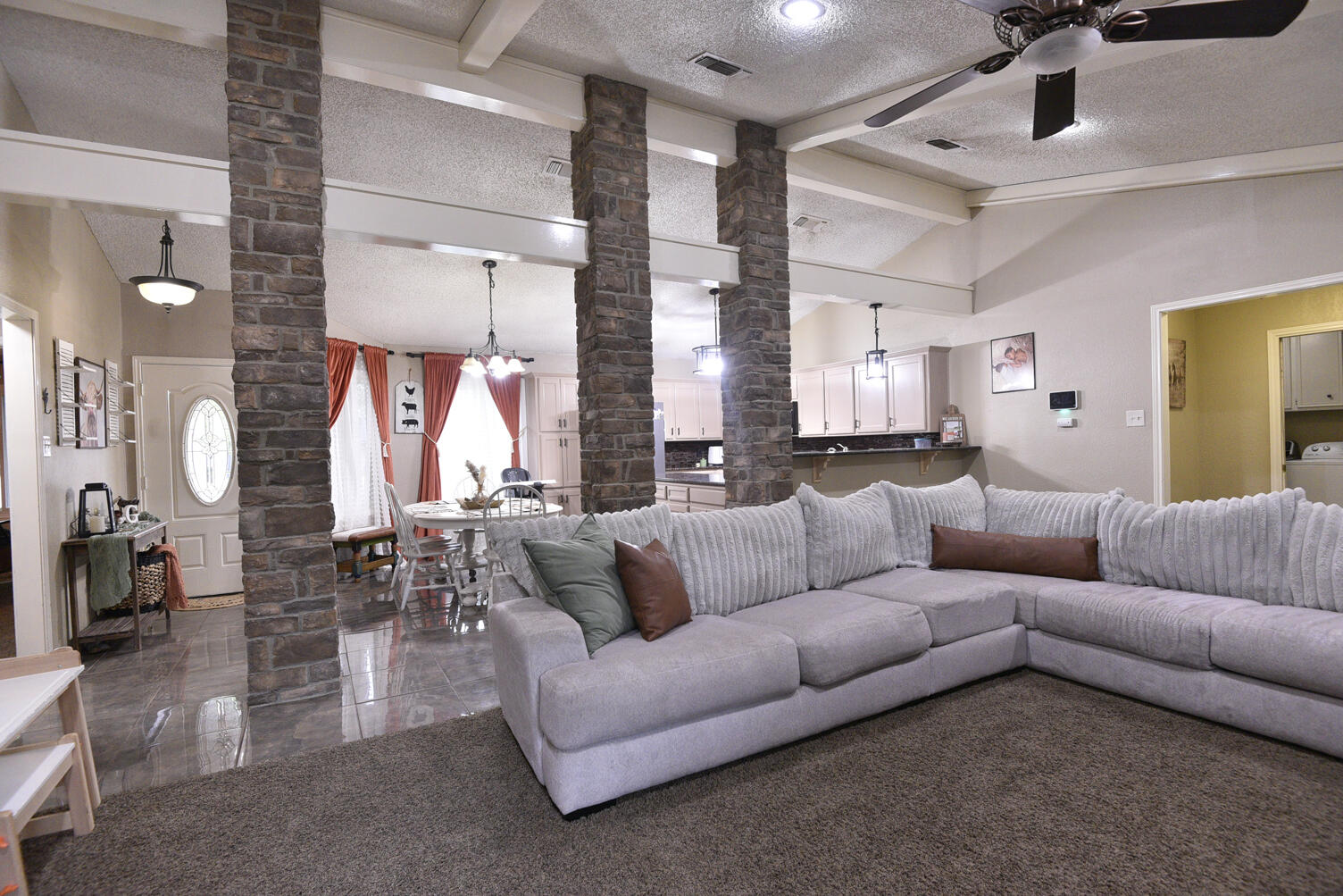 5202 93rd Street Lubbock, TX 79424 - Photo 3 of 28 a living room with furniture and a large window