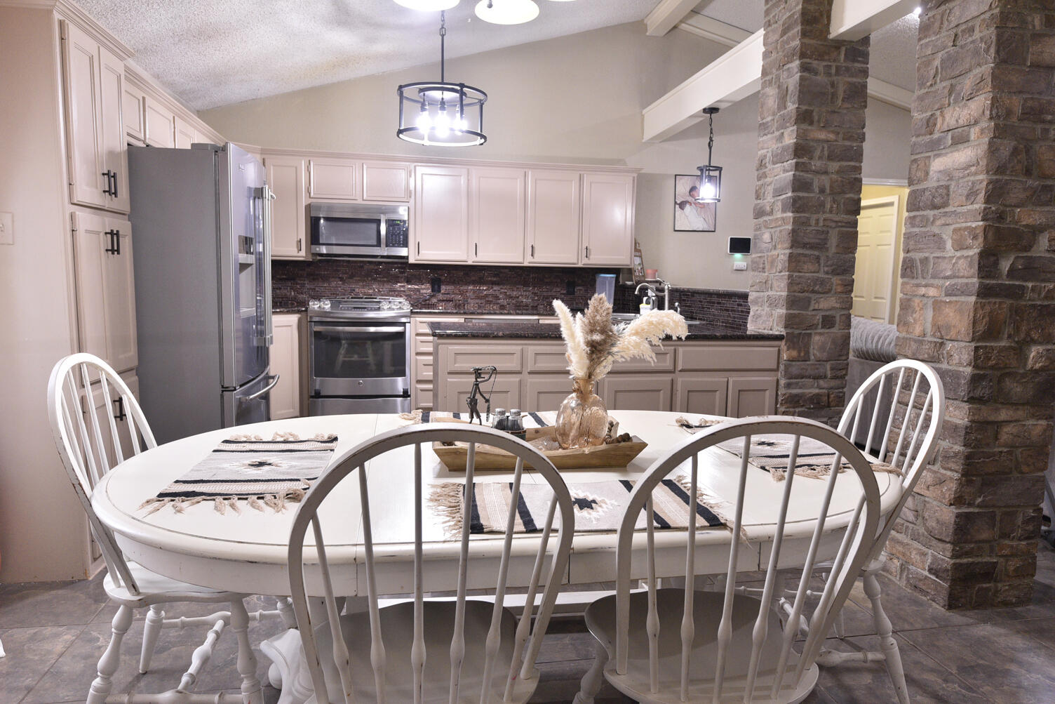 5202 93rd Street Lubbock, TX 79424 - Photo 8 of 28 a view of a dining room with furniture