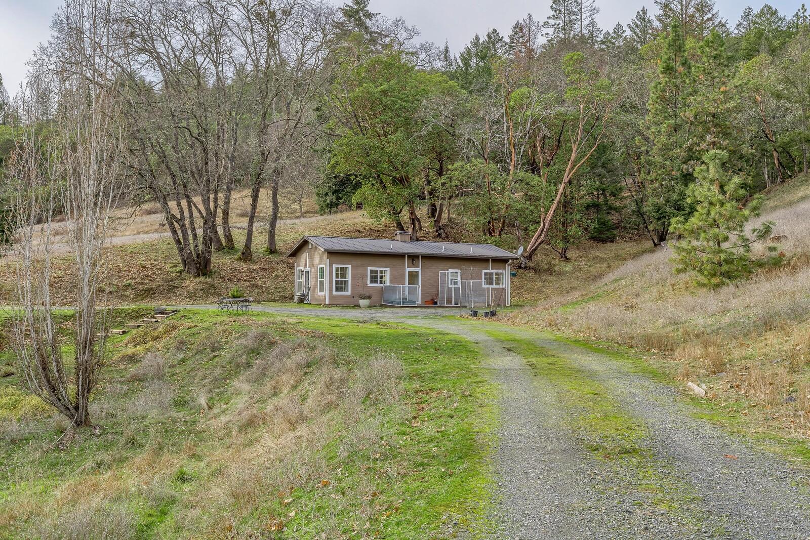 2128 Anderson Creek Road Talent, OR 97540 - Photo 71 of 87 a view of a house with a yard