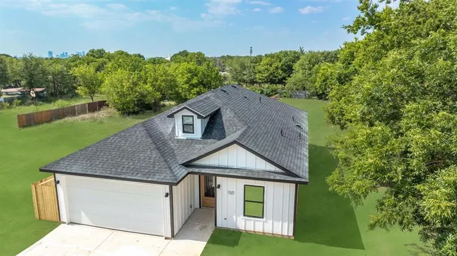 a house with river in front of it
