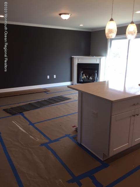 135 County Road Cliffwood, NJ 07721 - Photo 9 of 18 135 County Road family room with firepla