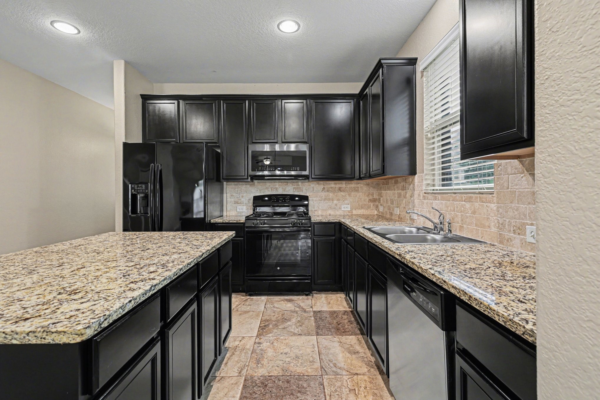 7011 Edwanna Lane Spring, TX 77389 - Photo 10 of 27 Kitchen view 3