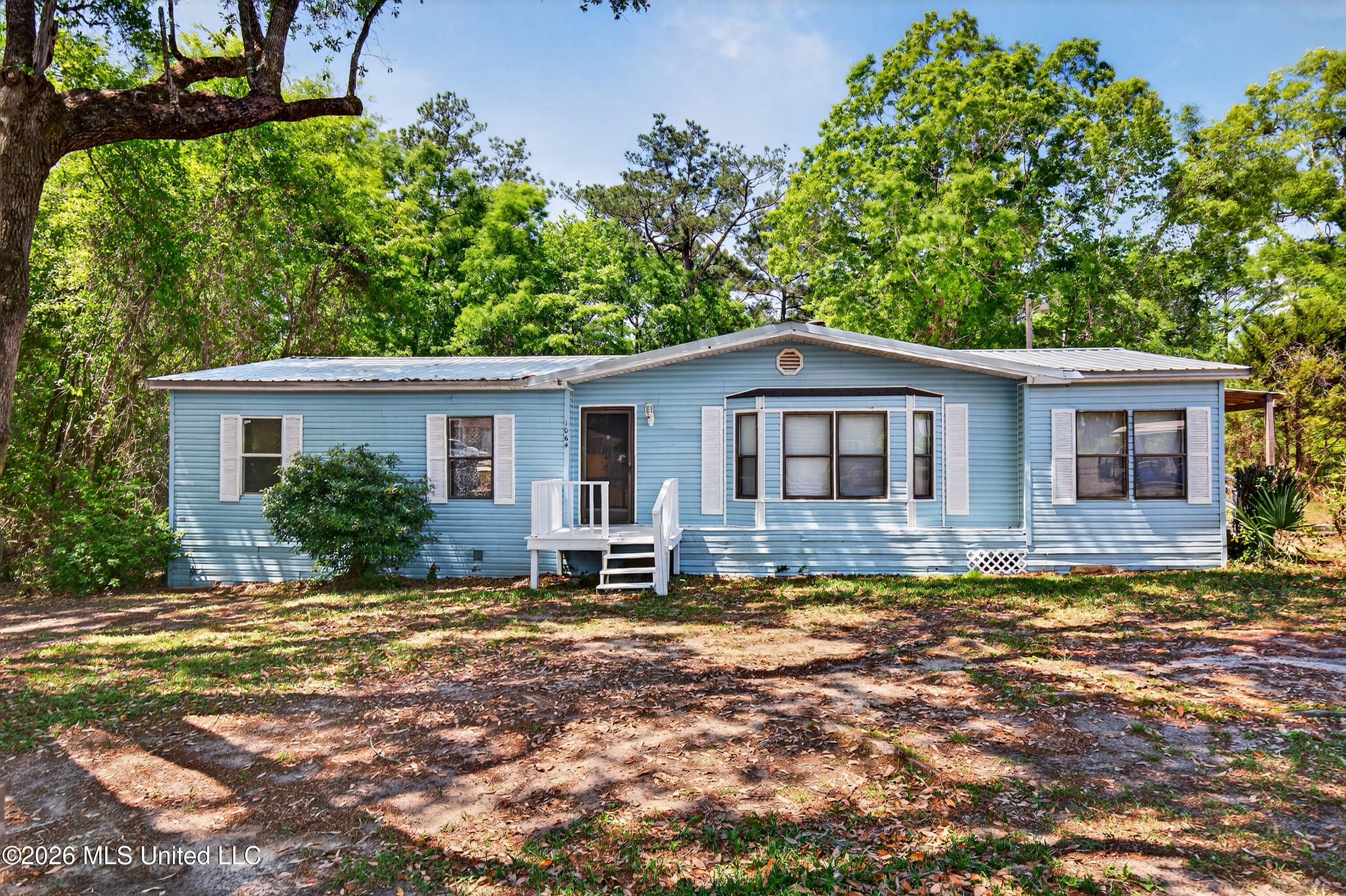 1064 Limu Way Diamondhead, MS 39525 - Photo 2 of 35 1064LimuWay-2