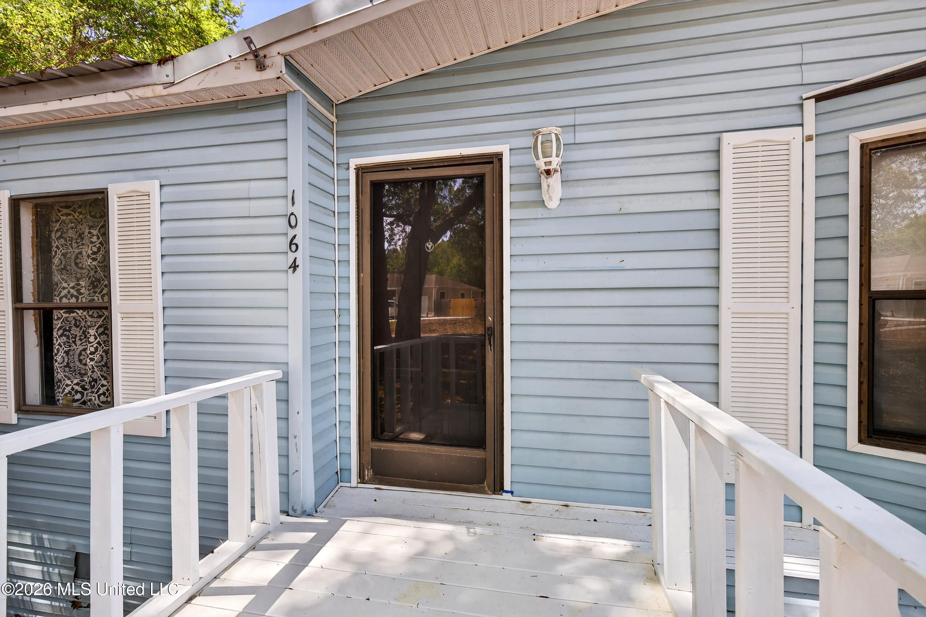 1064 Limu Way Diamondhead, MS 39525 - Photo 3 of 35 1064LimuWay-5