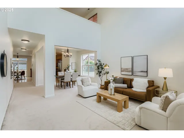 a living room with furniture and a large mirror