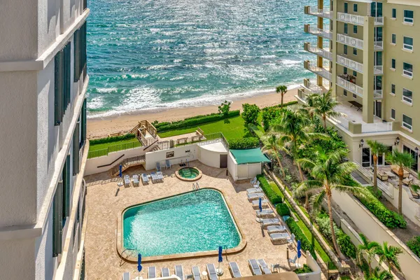 a view of a balcony with chairs