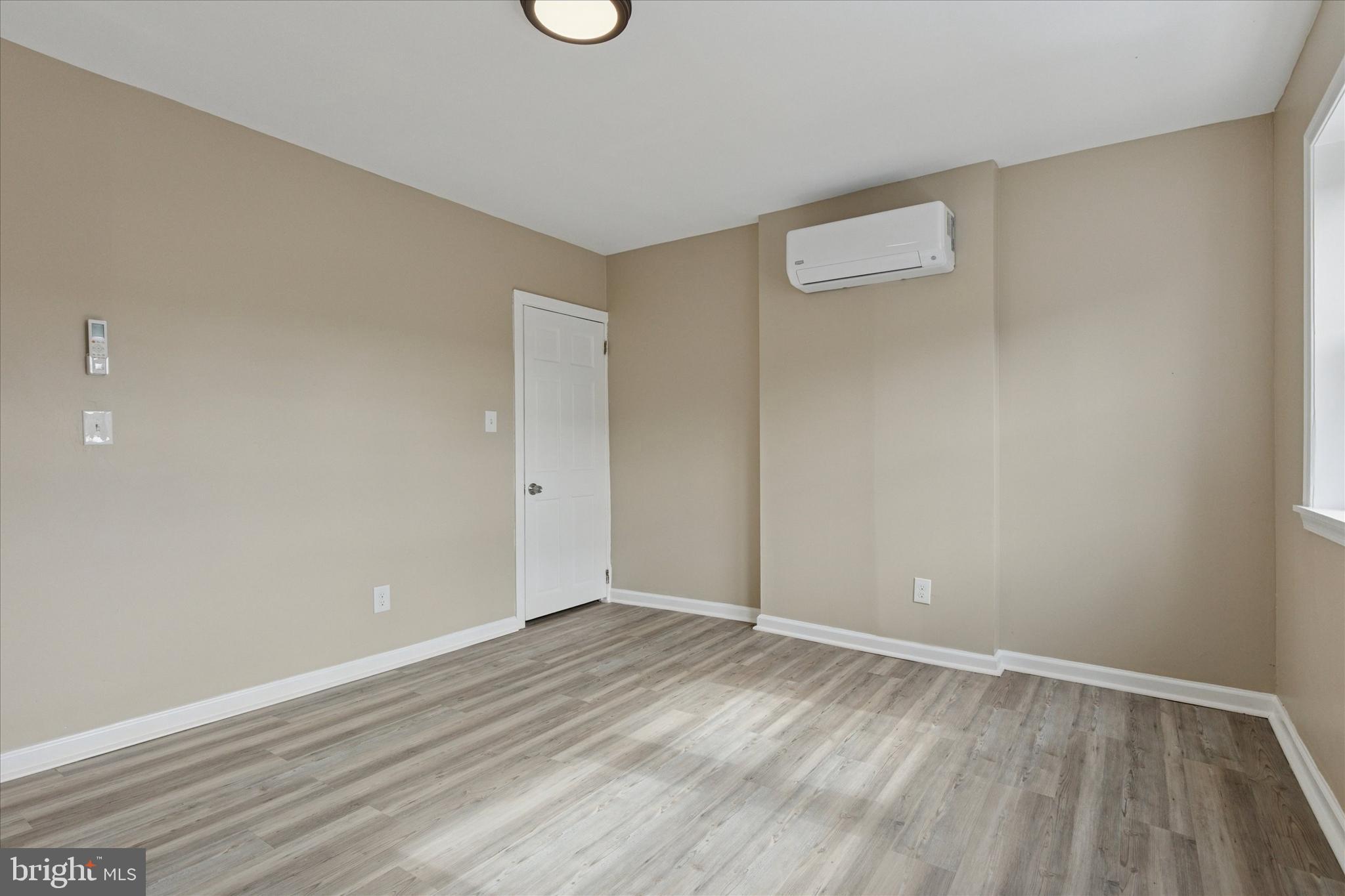 39 West Front Street Bridgeport, PA 19405 - Photo 15 of 23 a view of an empty room with wooden floor