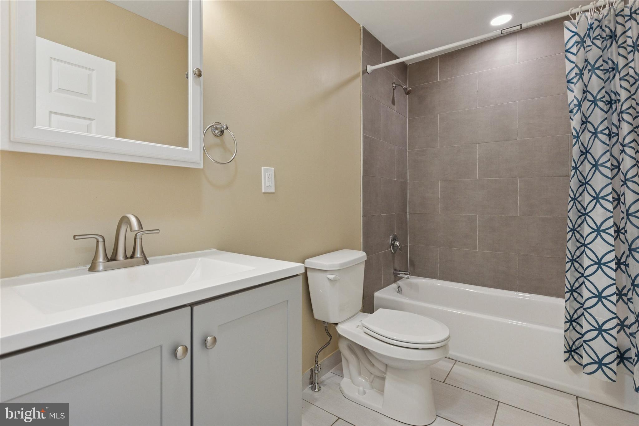 39 West Front Street Bridgeport, PA 19405 - Photo 16 of 23 a bathroom with a sink a toilet and shower