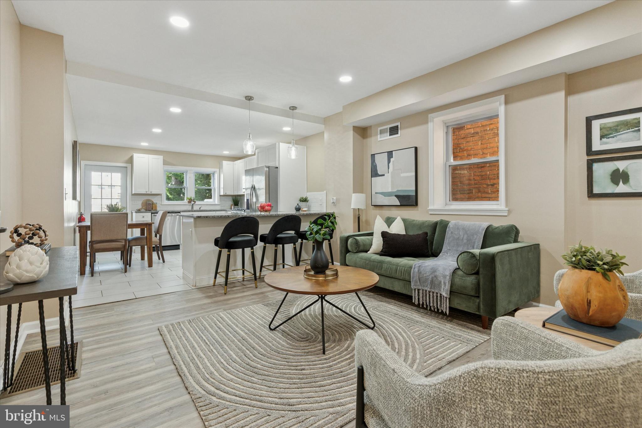 39 West Front Street Bridgeport, PA 19405 - Photo 6 of 23 a living room with furniture and wooden floor