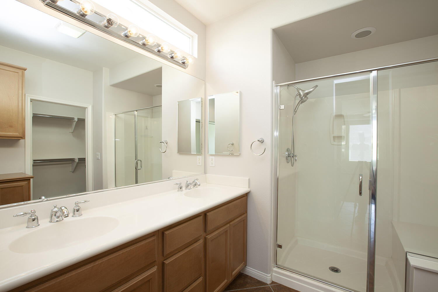 81237 Red Rock Road La Quinta, CA 92253 - Photo 16 of 21 a bathroom with a double vanity sink mirror and shower
