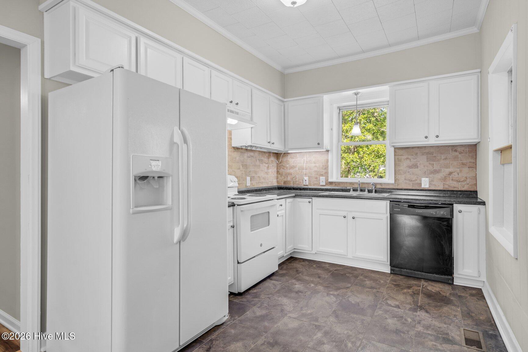 307 Irwin Street Pinetops, NC 27864 - Photo 12 of 21 Rear Kitchen – Functional Flow