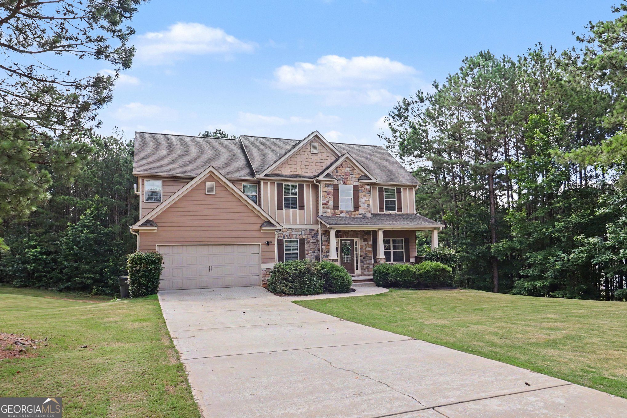 207 George Wynn Road Palmetto, GA 30268 - Photo 3 of 32 a front view of a house with a yard