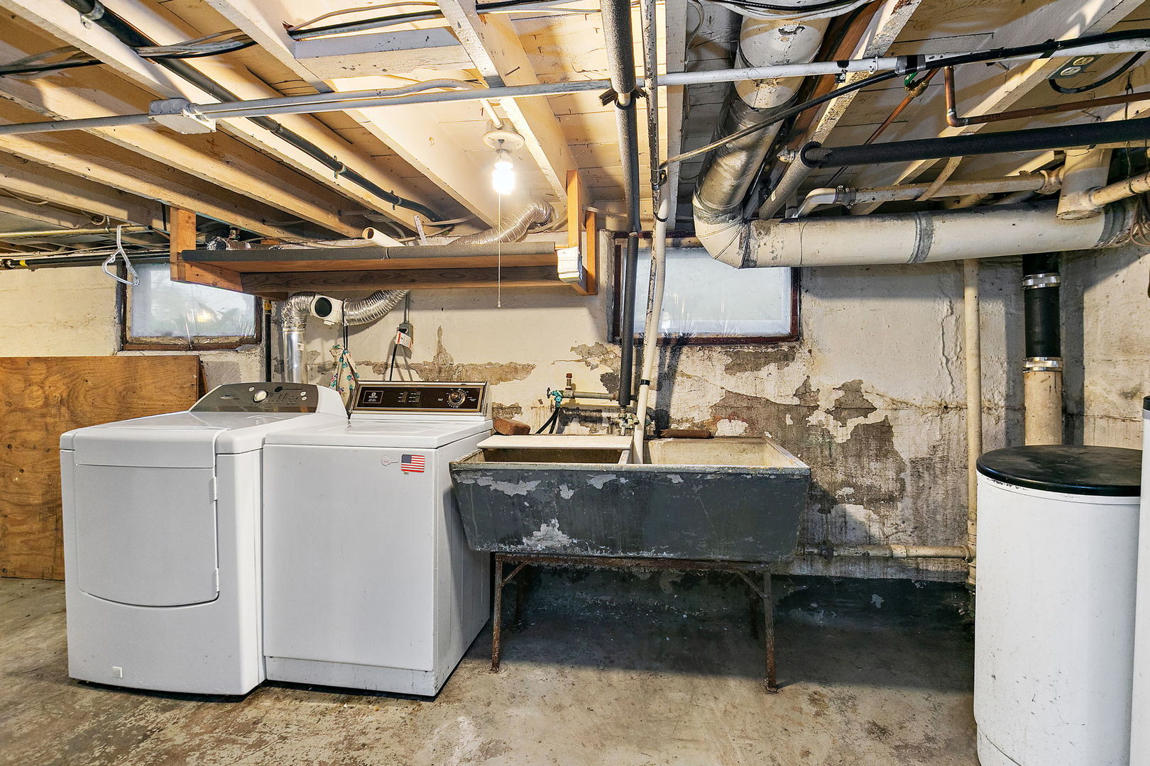 148 Holly Street DeKalb, IL 60115 - Photo 21 of 27 a room with storage and utility