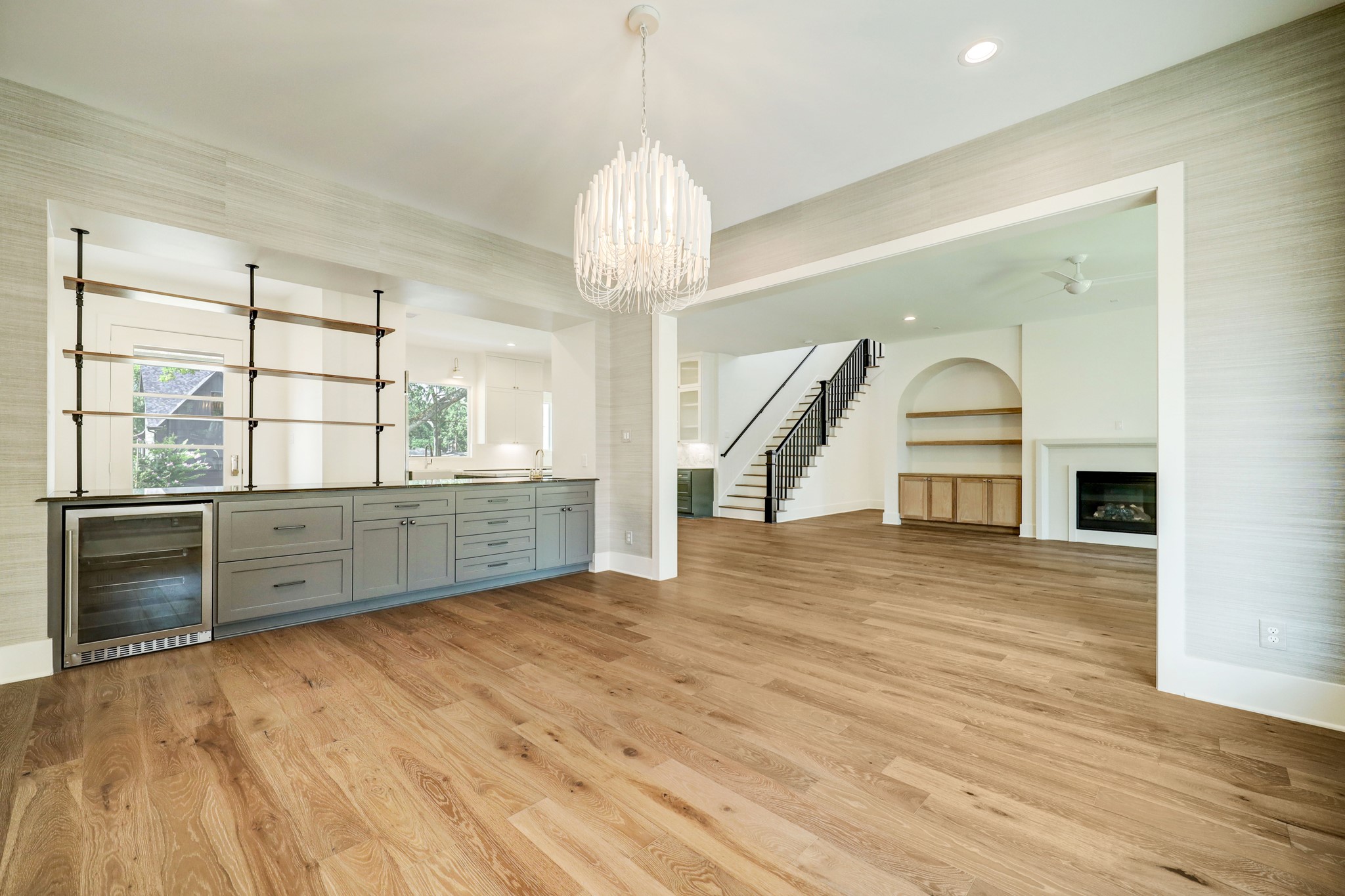 1510 Chantilly Lane Houston, TX 77018 - Photo 7 of 50 Alternate view of dining room overlooking living room and kitchen. - Previous work by the builder, not representation of current build.