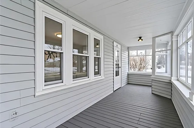 a view of a room with windows