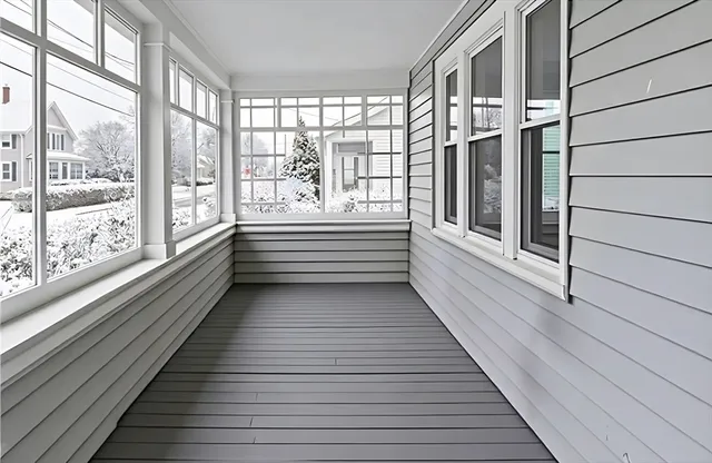 a view of a balcony with wooden floor