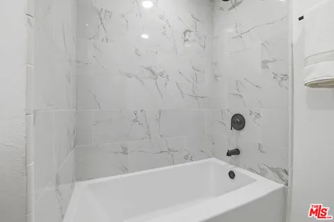 a bathroom with a tub