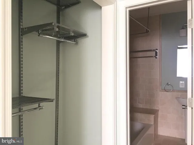 a bathroom with a sink double vanity and a mirror