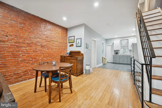a workspace with furniture and wooden floor