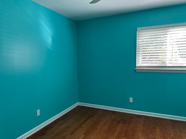a bathroom with a tub a sink and a shower