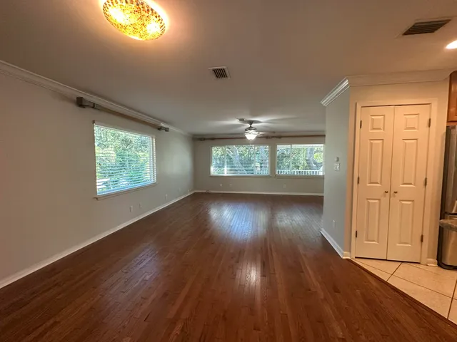 a view of a backyard with a sitting area
