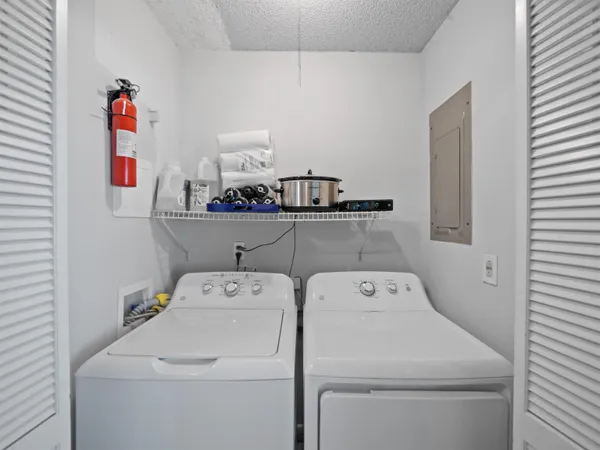 a utility room with dryer and washer