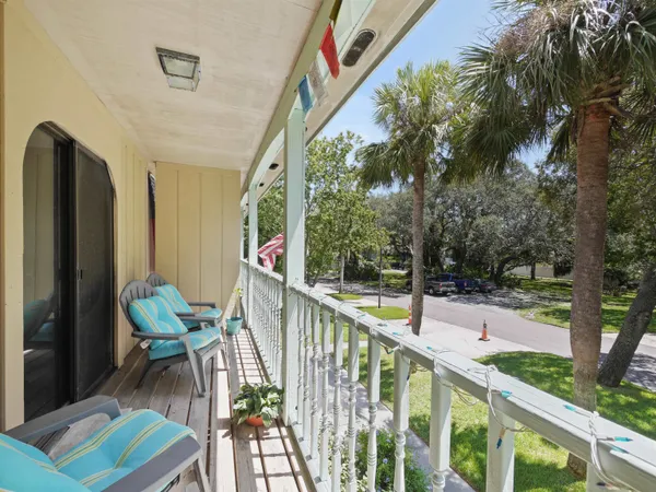a view of balcony and furniture