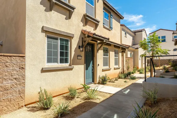 a view of a house with a patio