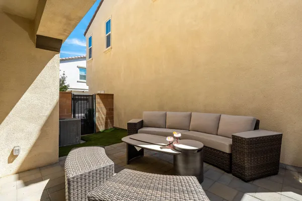 a view of swimming pool with a patio