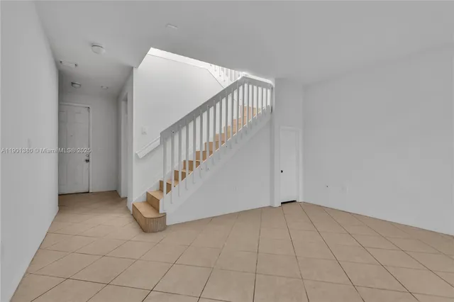 a view of an entryway with staircase