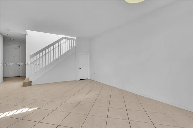 a view of an entryway with staircase