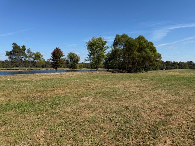 405 Smith Road Crossville, TN 38571 - Photo 14 of 28 a view of a large body of water with a building in the background