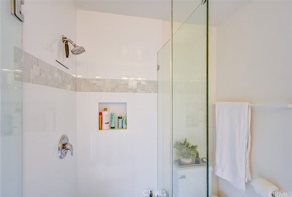 401 Canal Street Newport Beach, CA 92663 - Photo 20 of 27 a view of a bathroom with a shower