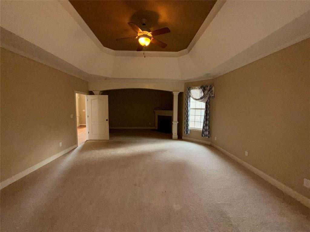 75 Cannonade Court Covington, GA 30016 - Photo 17 of 20 a view of empty room with a fireplace